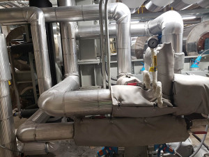 Hot oil piping with custom removable pads and stratafab pipe cover, finished with aluminum jacketing. Franklin insulation gallery