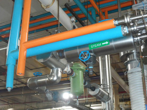 Steam pipe covered in foam glass with a stainless steel jacket and custom label. Domestic hot and cold water lines insulated in fiberglass and color- coded PVC jacket. Franklin insulation gallery