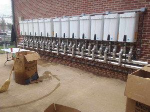 Water heater piping for laundry facilities at a county jail. Pipes were heat traced for freeze protection, insulated with fiberglass, and finished with a aluminum jacketing. Franklin insulation gallery